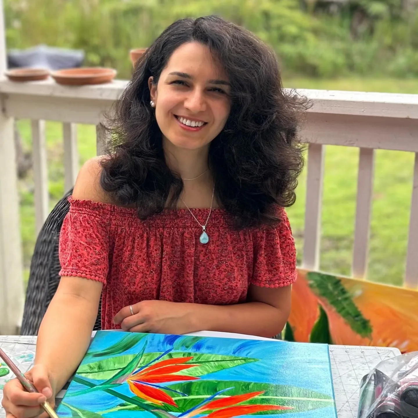 Sahar painting in the studio